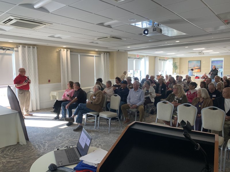 Tom Draper, a seasonal police officer from the early ‘80s, addresses the crowd